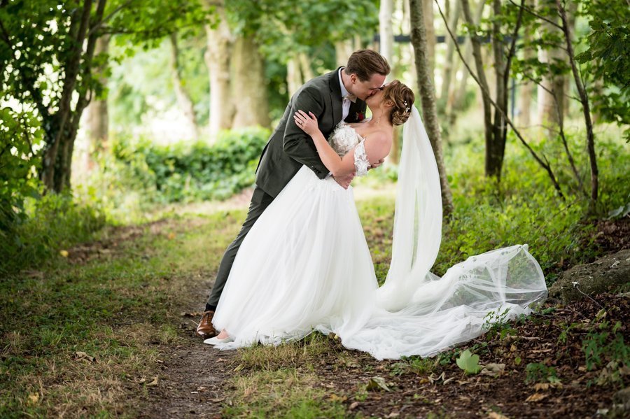 Sussex wedding photographer. Bride and Groom at Cissbury Barns, Sussex